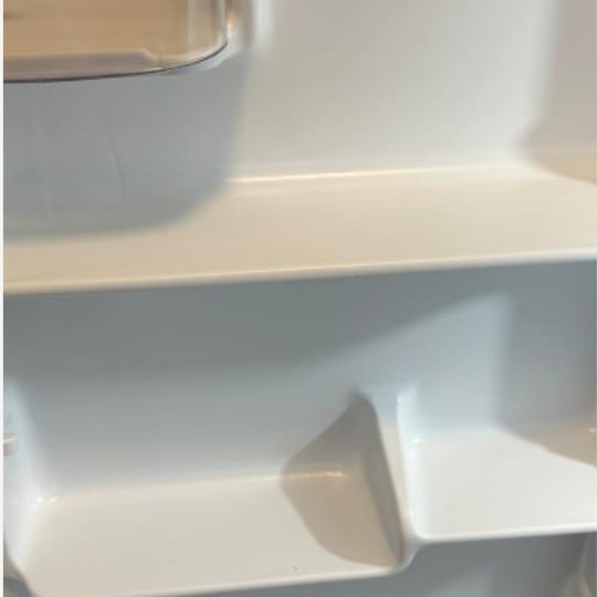 Freshly cleaned refrigerator shelves and drawers